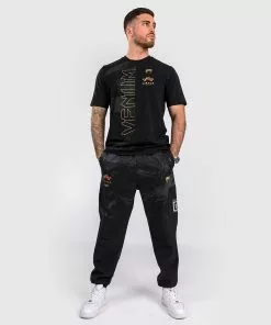 Pantalon De Jogging Venum X Mirage - Noir/Or 19 Pantalon De Jogging Venum X Mirage - Noir/Or -Magasin D'usine Venum 4f4dae711d55d4d06fc881d2533769bf1bcac7c4 JOGGING MIRAGE BLACK GOLD 09