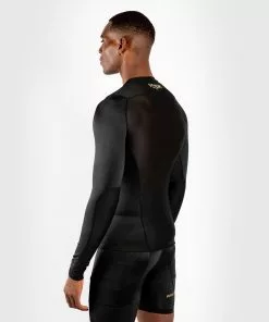 Rashguard Venum G-Fit - Manches Longues - Noir/Or -Magasin D'usine Venum cf9c889782e0a4daf8004c3b55f418e584fb20d7 RASH LS GFIT BLACK GOLD SD 04